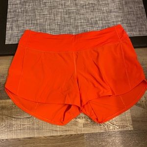 Beautiful coral orange lulu run shorts